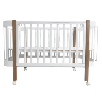 Кровать детская Indigo Italiano Baby продольный маятник на колеса 