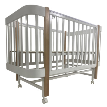 Кровать детская Indigo Italiano Baby продольный маятник на колеса 