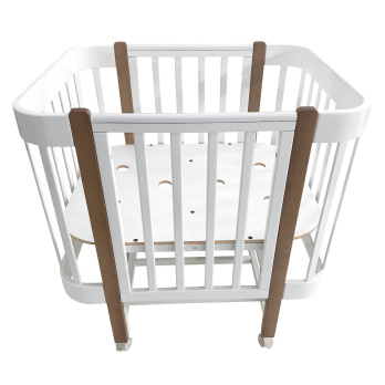 Кровать детская Indigo Italiano Baby продольный маятник на колеса 