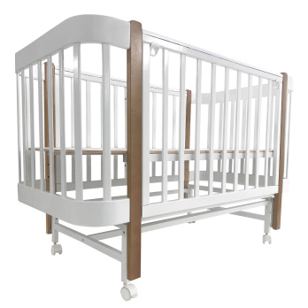 Кровать детская Indigo Italiano Baby продольный маятник на колеса 